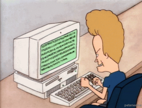 gif of beavis from beavis and butthead typing on a computer